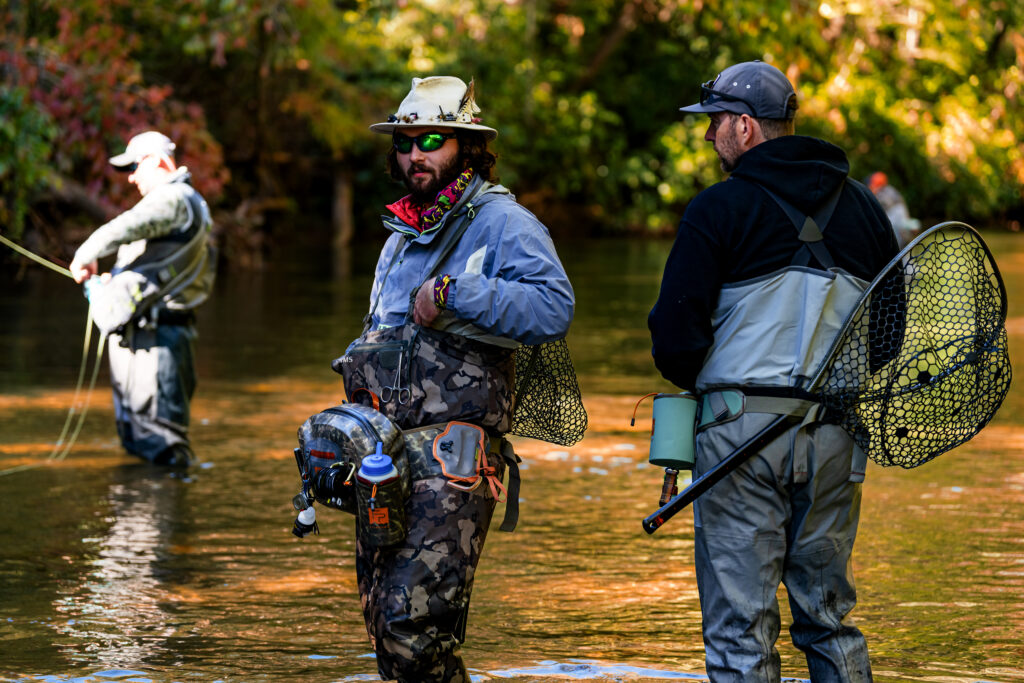 group of fishermen in waders
